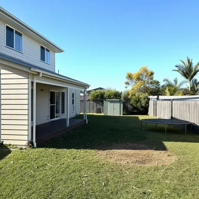 After: Leaning red gum, sectional dismantling over a shed, Bendigo